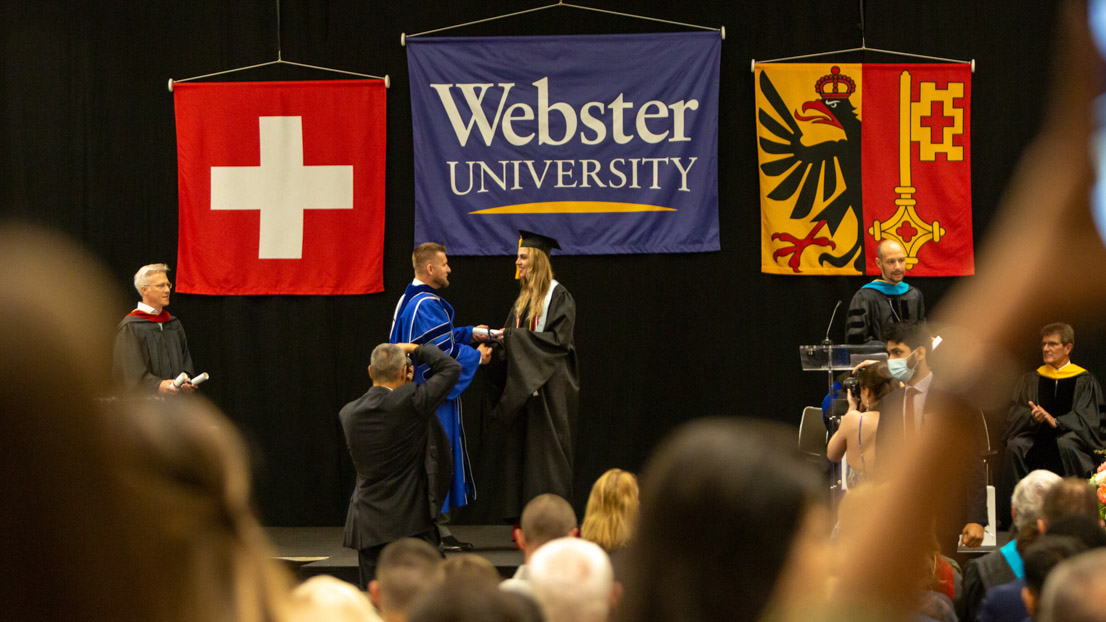 Wide shot of the stage at Webster University in Geneva commencement, 2022. 